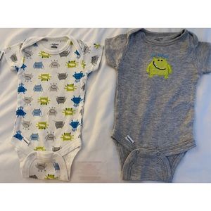 Four onesies with no marks or flaws.